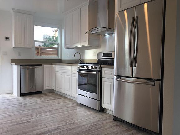Kitchen new stainless steel range, refrig., dishwasher