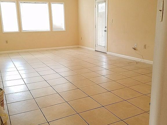 Spacious Living Room, bright, tall vaulted ceilings