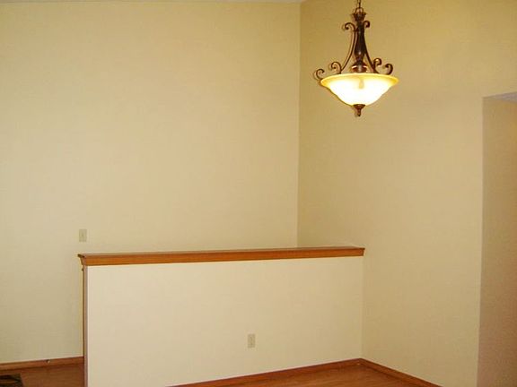 This dining area is convenient to the kitchen which is just around the corner.  It is also open to the living room for easy entertaining. 