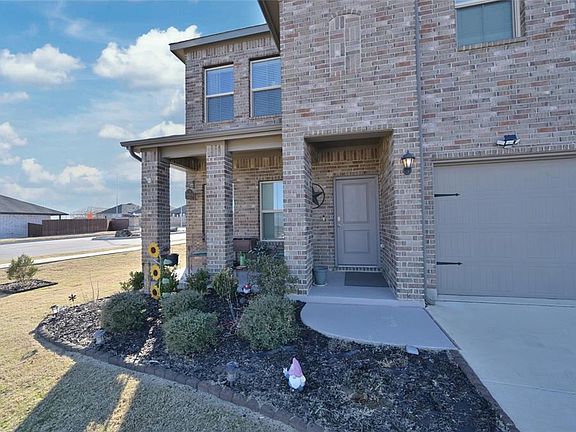 Wide covered front sitting porch