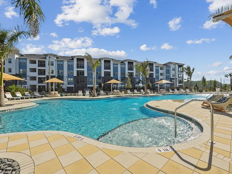 Resort-Style Pool with Sun Shelf and Grilling