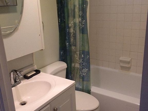 Full bath (new floor tiles, new sink & mirror units)