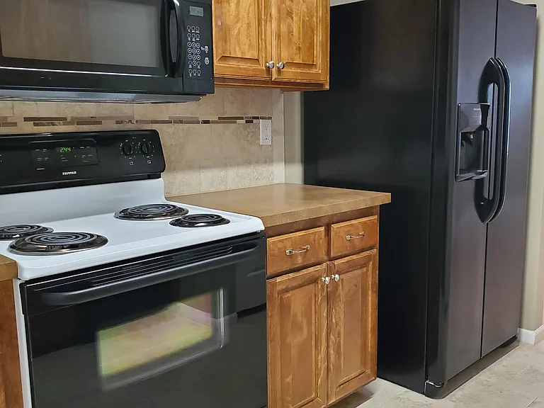 Kitchen comes with all appliances: Stove/oven, dishwasher, fridge, microwave & disposal.