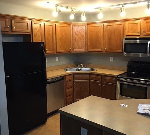 Large kitchen area with breakfast island and all new applian