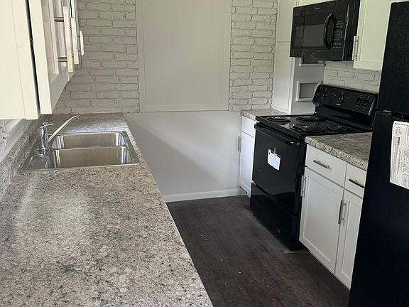 Kitchen standing in the dining room.