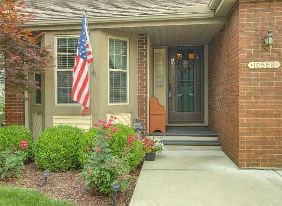 Metal Siding with brick trim