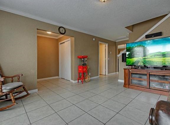 Half bath downstairs in between your living and spacious dining and kitchen area.