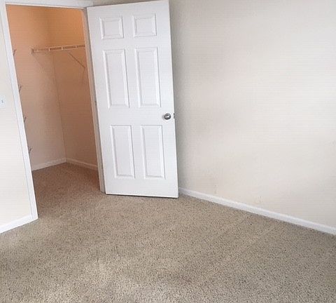 Bedroom with walk in closet.