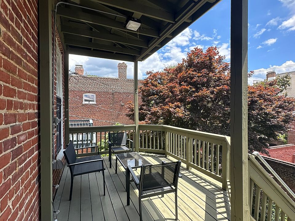 Second floor, covered deck at rear