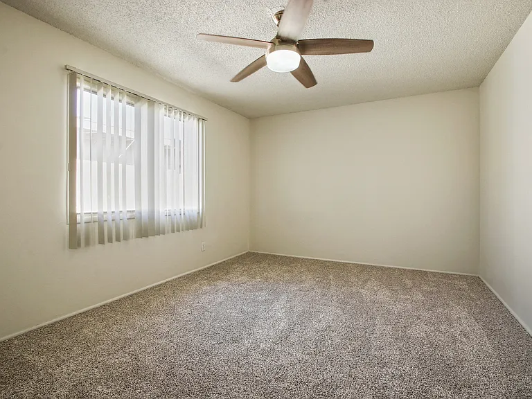 Bedroom with carpeted flooring