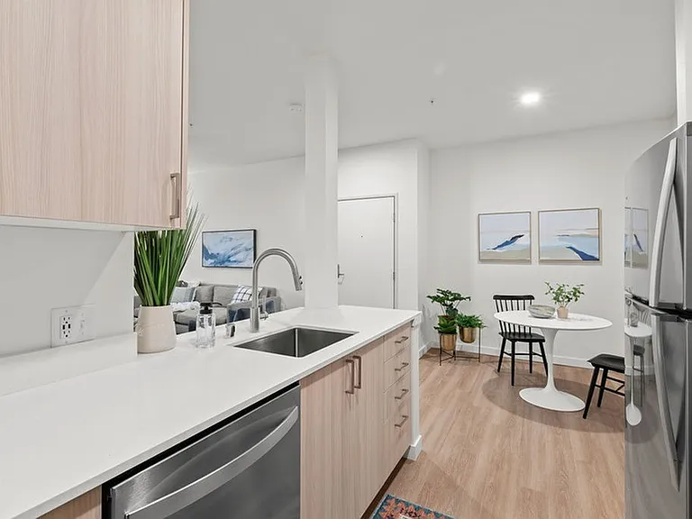 Explore our exquisite home collection showcasing high-gloss cabinets, upgraded finishes, and beautiful eating and sitting areas for a premium living experience.