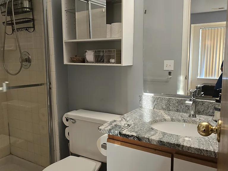 Bathroom 1: Attached to master bedroom with standing shower