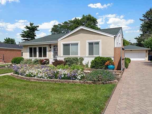 Adorable Curb Appeal With Hassle Free/All Perennial Landscape Beds, Brick Driveway and Flagstone Wal