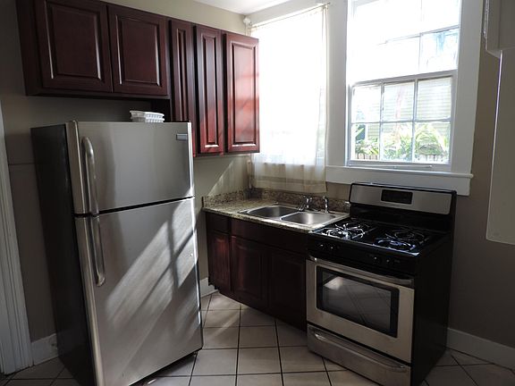 Kitchen has granite counter tops and stainless steel appliances