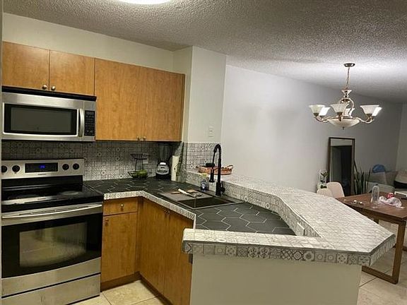 4th image of 8750 N Sherman Cir #20H