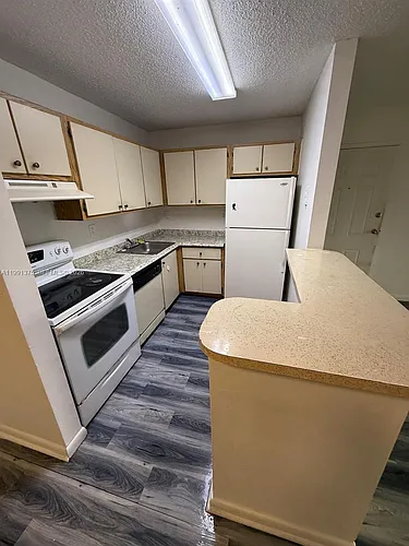 7210 NW 179th St #203 Photo 1