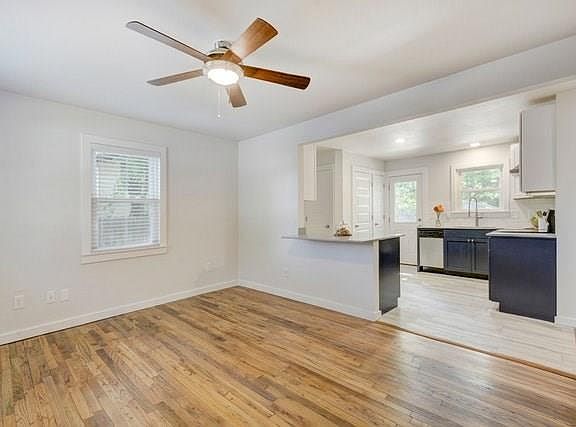 Living room opens to the kitchen