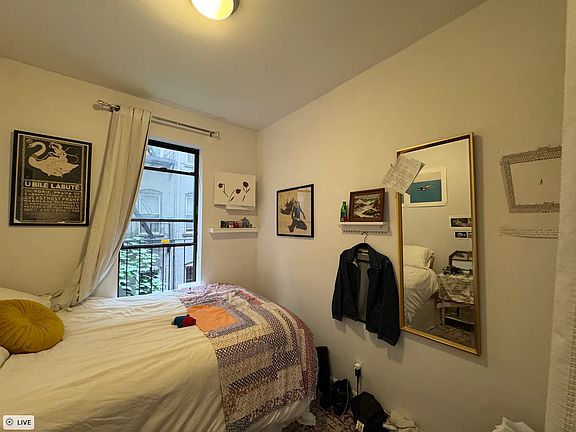 5th image of 318 E 11th St APT 13