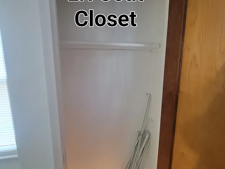 Coat closet off Living-room before staircase to 2nd floor.