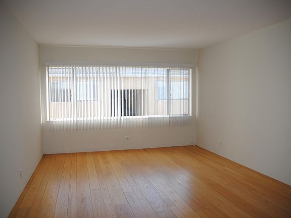 Spacious living room with beautiful hardwood floors