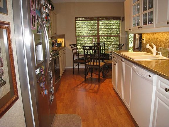 All updated kitchen, NEW s/s appliances, granite counter tops, white foil cabs