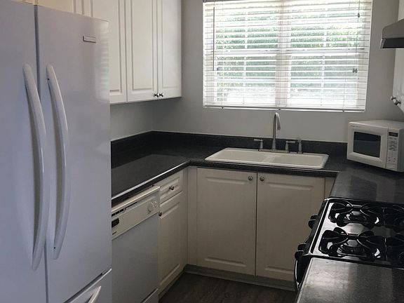 Please note: The stove has been updated since this picture was taken. Microwave is no longer present.