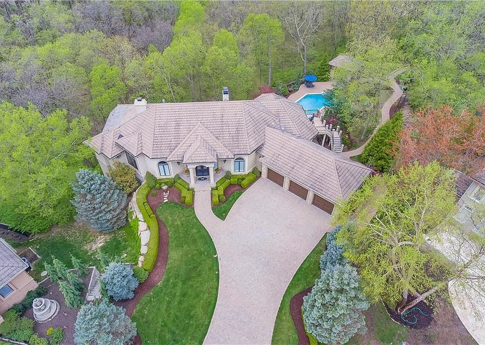 This Spectacular Property sits on a 2.1 Acre Wooded Lot