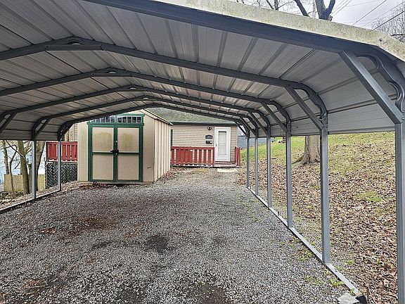 VIEW  OF CARPORT SHED