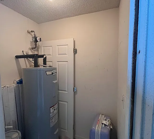 Outside storage room (water heater new 2023)