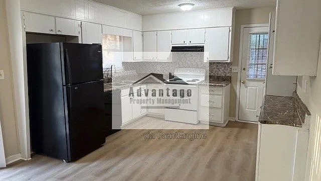 4 bed, 1.5 bath, 1201 sqft, $1,565 — Photo 3