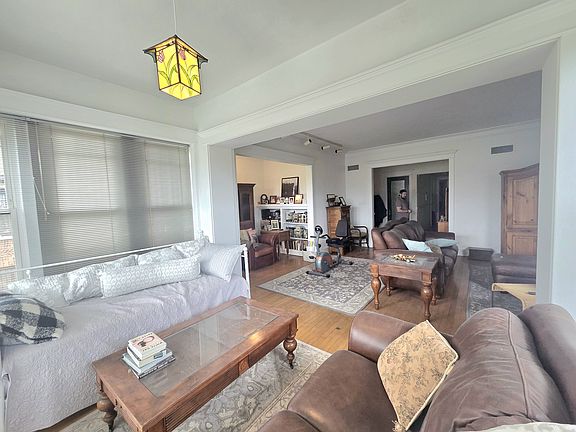Living room looking in to foyer
