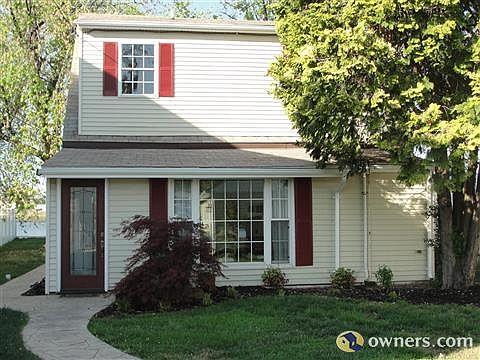 New stamped and dyed concrete walkway from front gate to deck