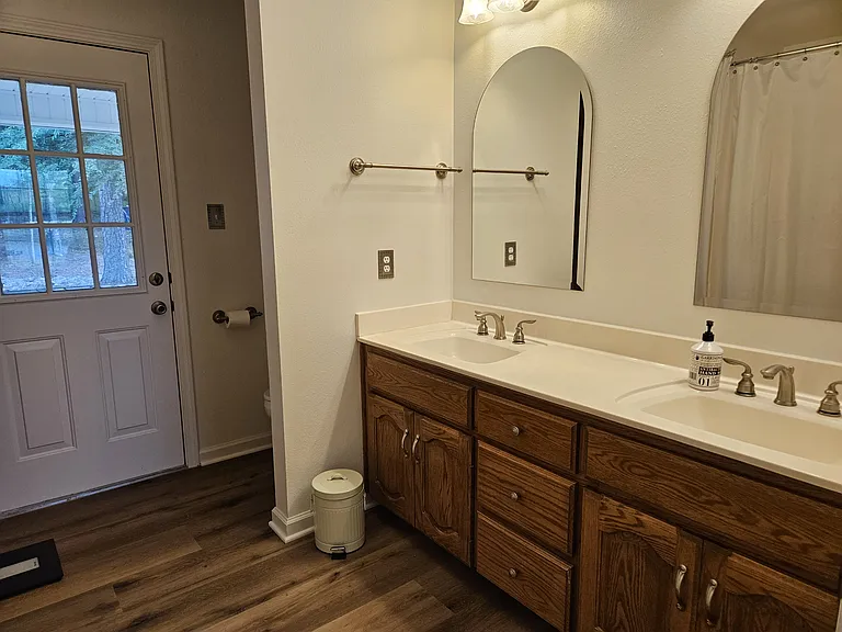 Owner's bedroom with attached bathroom may be made available for an additional monthly rental of $500. Large walk in shower, handicapped accessible, with large linen closet.