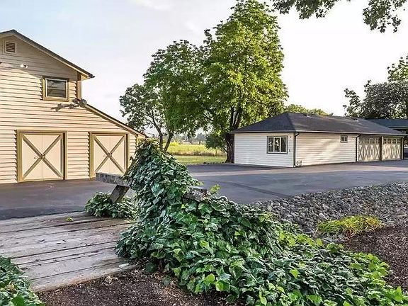 Backside of studio unit (two windows upstairs)