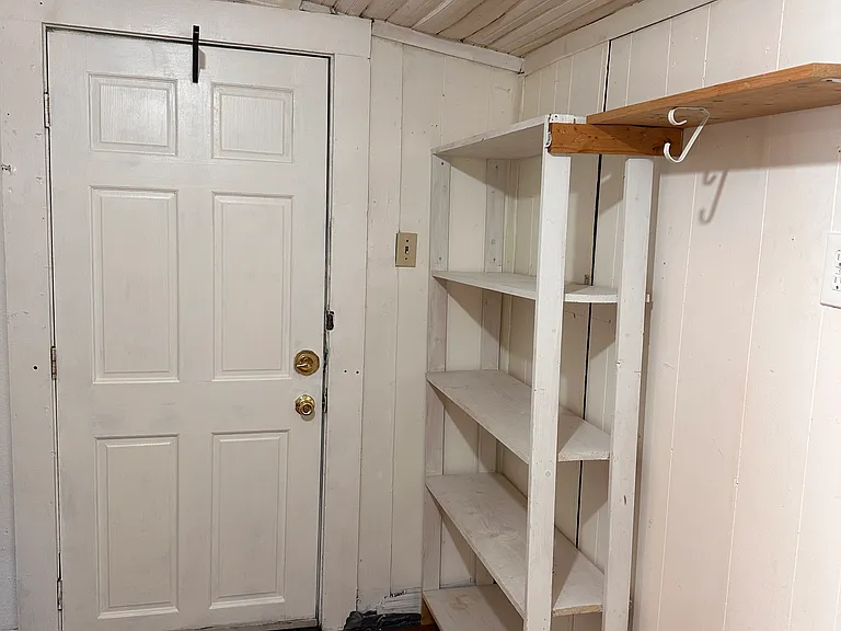 Laundry room/mud room with exit to side porch