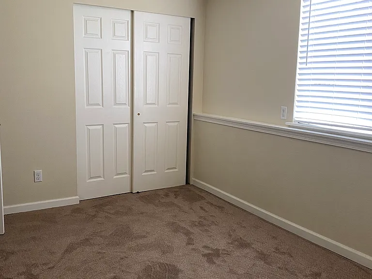 another bedroom with newer carpet