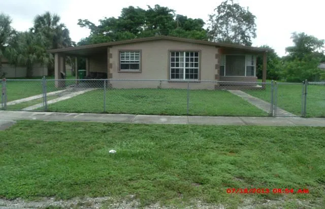 3311 NW 6th Ct — Photo 1