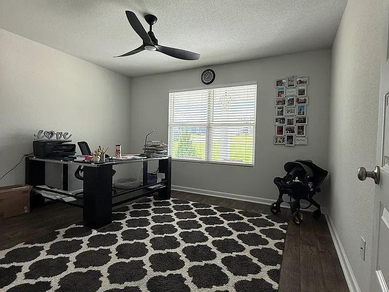 Room #2 with ceiling fan.
