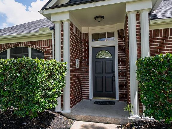 A traditional pathway leads you to the covered front porch! The exterior of this home was recently painted in 2020.