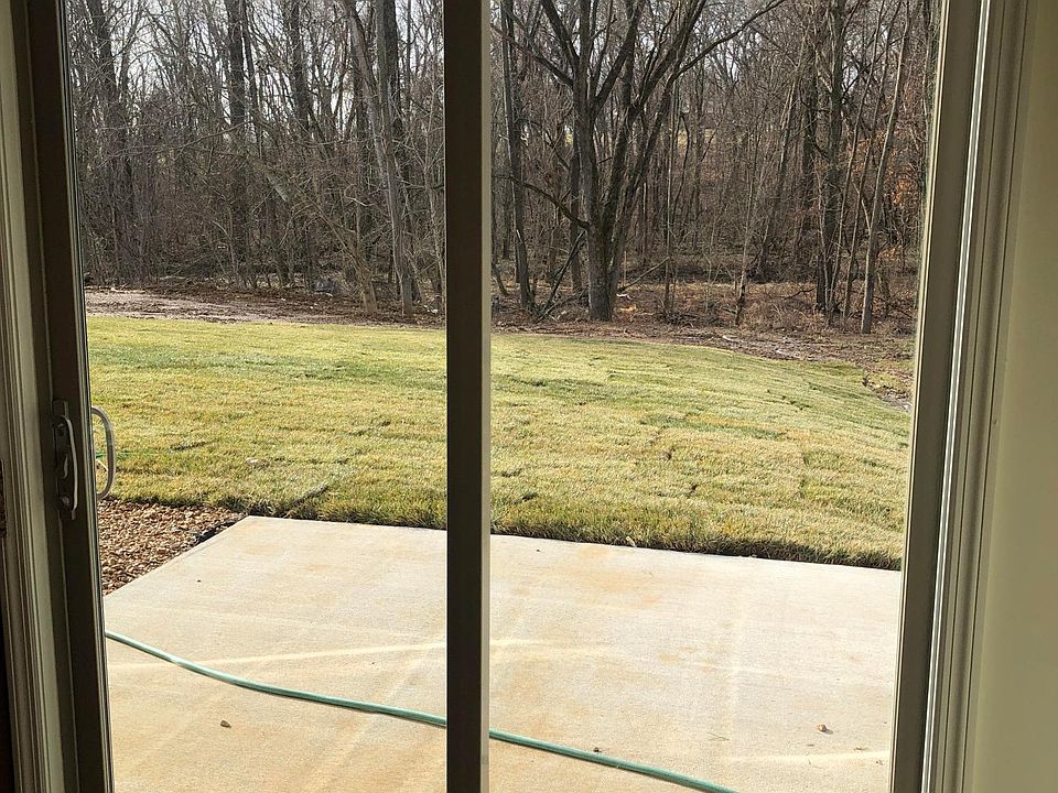 walk out patio to wooded sodded backyard / privacy fences in between each unit. 566 is an end unit