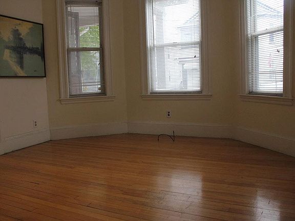 Formal living room with bay windows