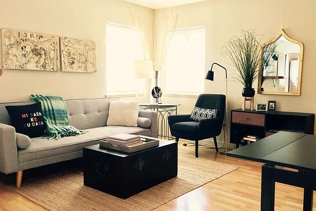 hardwood floors in the open living, dining and kitchen areas