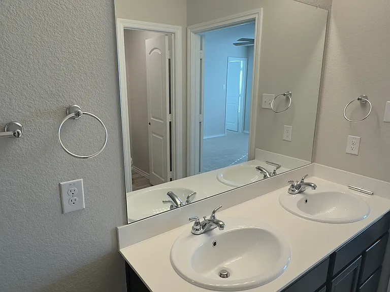 Vanity of master bedroom restroom