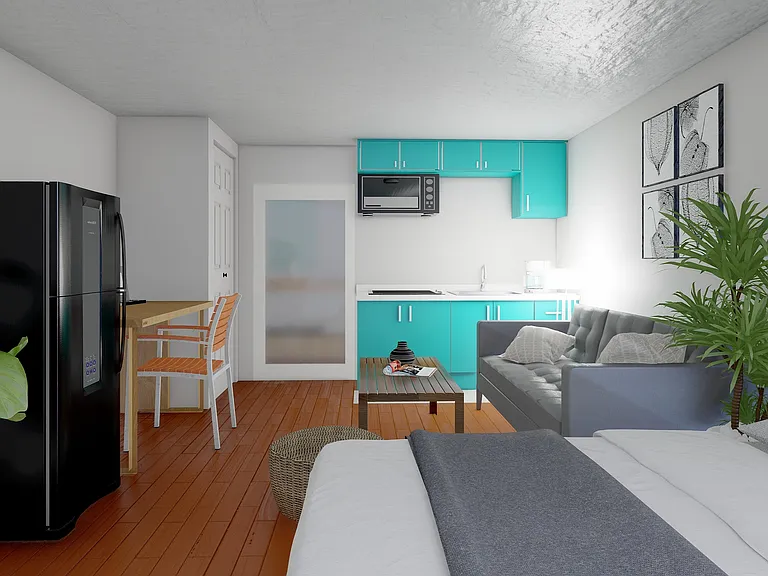 Explore this contemporary studio designed for comfort, with a vibrant kitchen and cozy seating area.