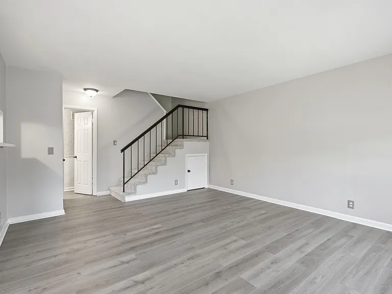 View of Living Room and Stairs to 2nd Floor