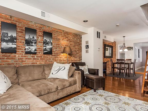 Exposed Brick and Hardwoods!