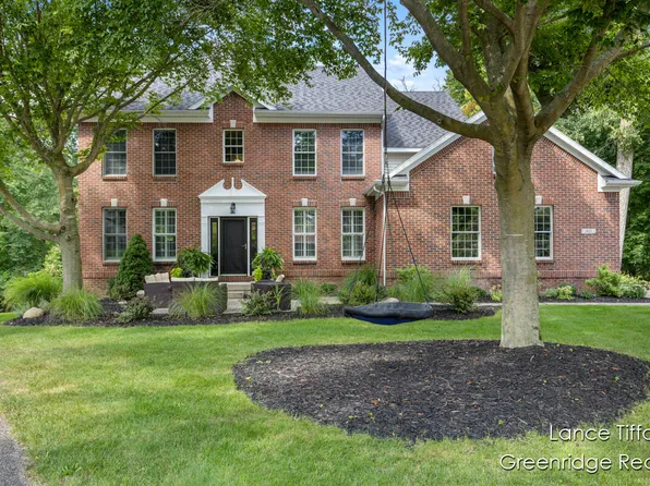 411 Scarborough Ct SE, Ada, MI 49301