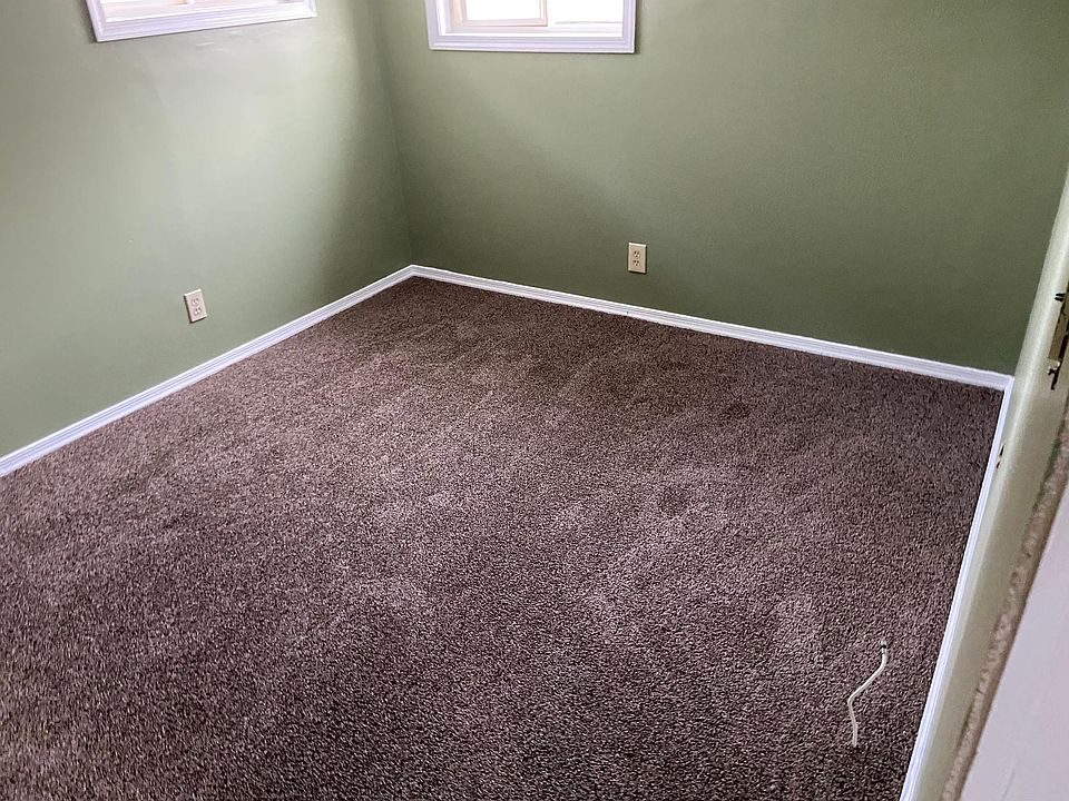 Bedroom and living room got carpet kitchen has tile