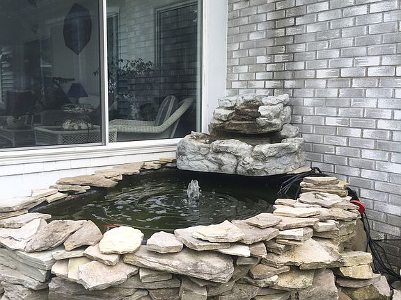 Pond with waterfall and coy pond.