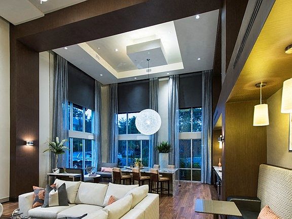 Resident lounge with ample seating and work-from-home spaces